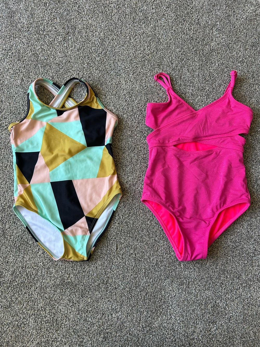 Two one piece swim suits